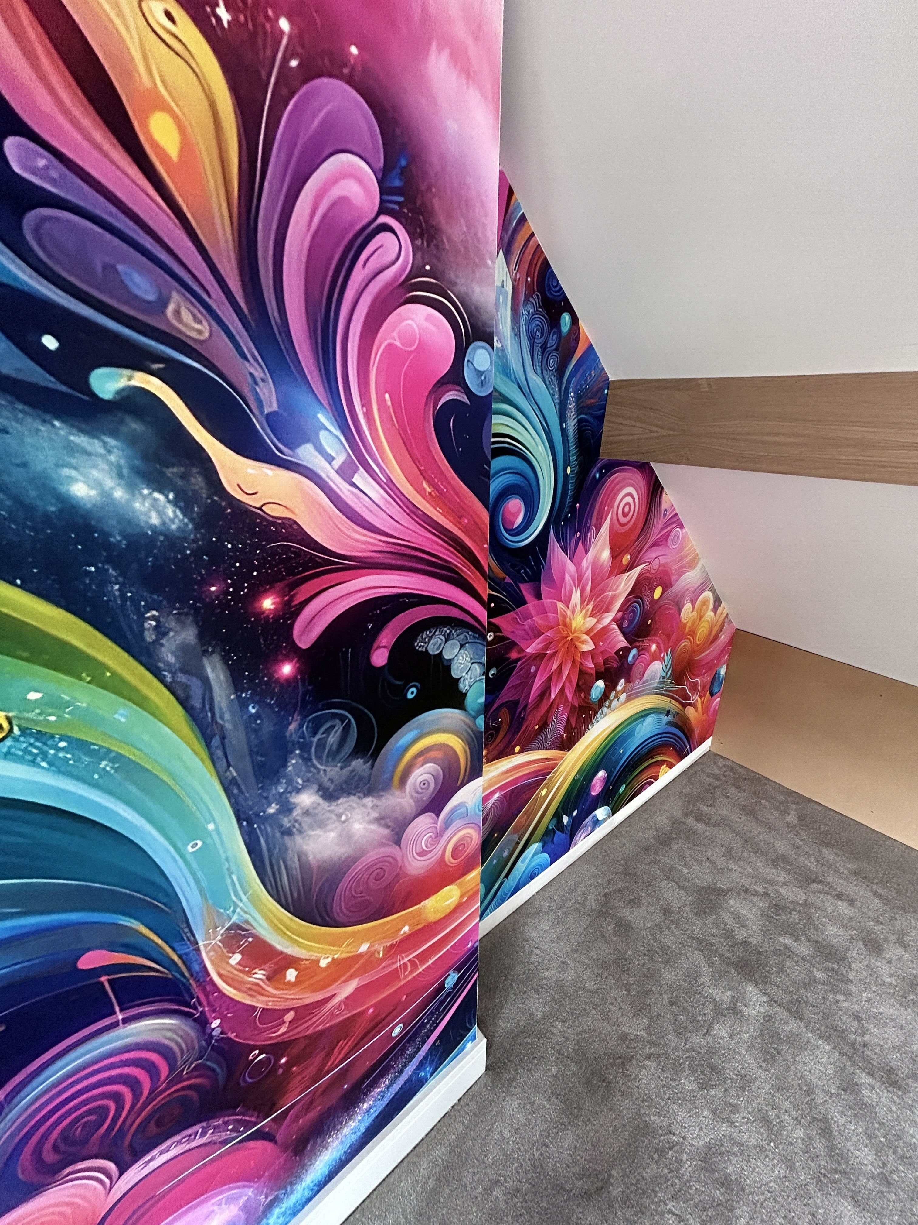 Vibrant rainbow swirl abstract mural residential corner