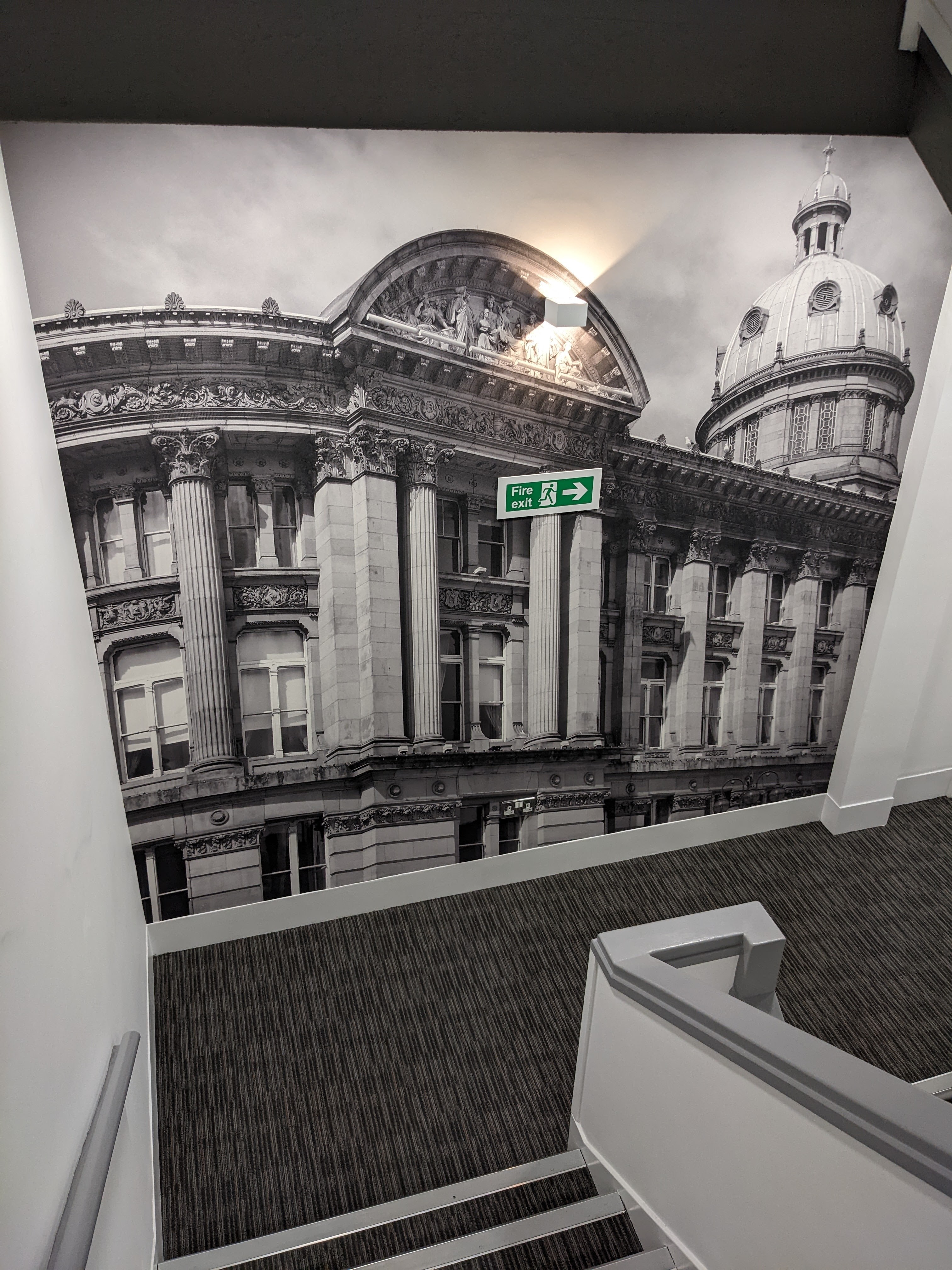 Black and white classical architecture stairwell mural